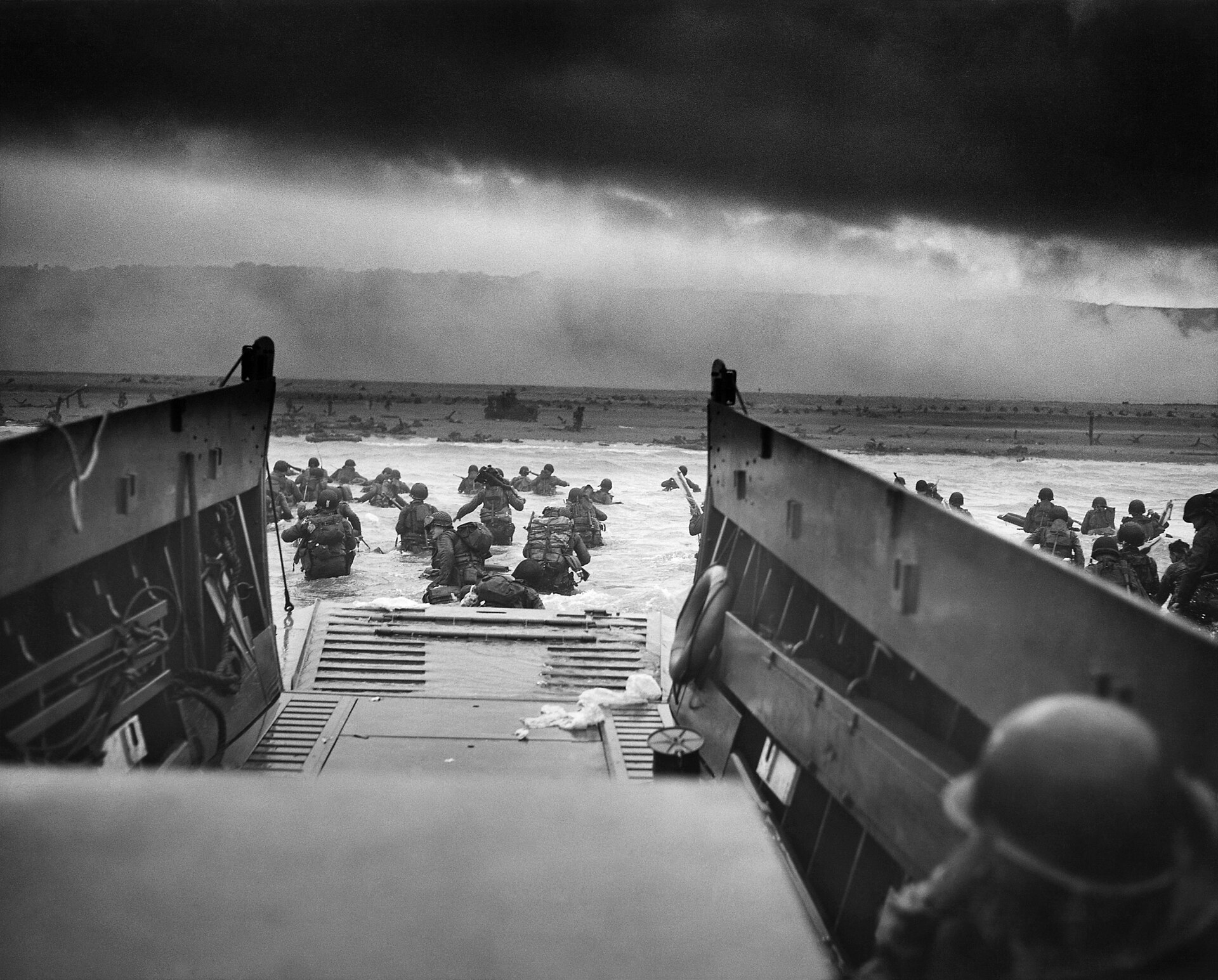 A landing craft full of American troops approaches Omaha Beach at dawn on June 6, 1944